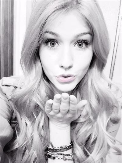 Katherine McNamara taking a selfie
