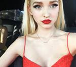 Dove Cameron taking a selfie