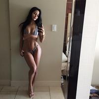 Katya Elise Henry in a bikini taking a selfie