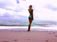 Darya Klishina in a bikini - ass