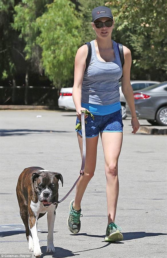 Kate looking sexy walking with dog.