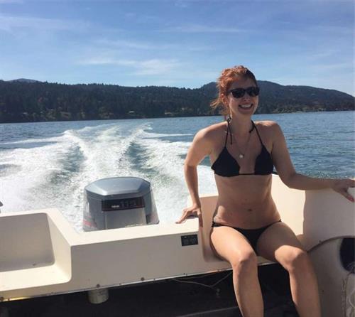 Jewel Staite in a black bikini