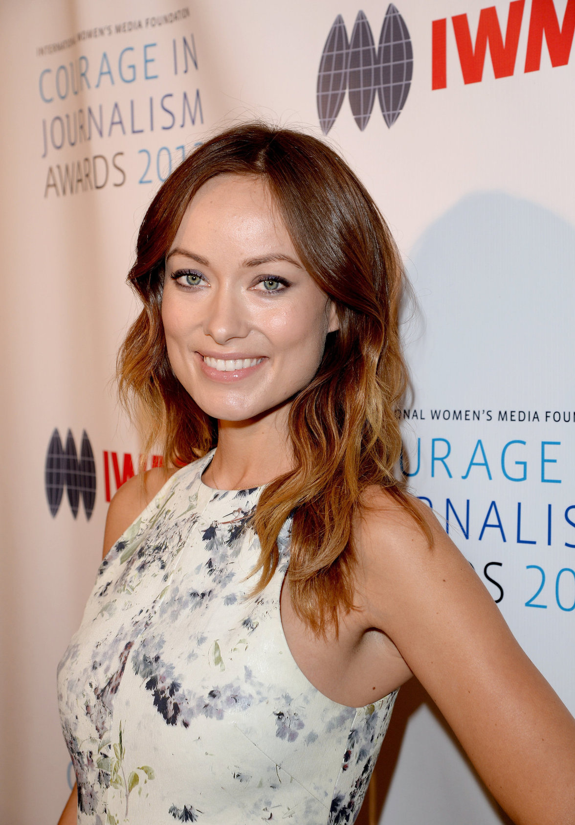 Olivia Wilde debuts her small baby bump while attending the 2013 International Women’s Media Foundation’s Courage in Journalism Awards at the Beverly Hills Hotel on Tuesday (October 29, 2013) in Beverly Hills, Calif.