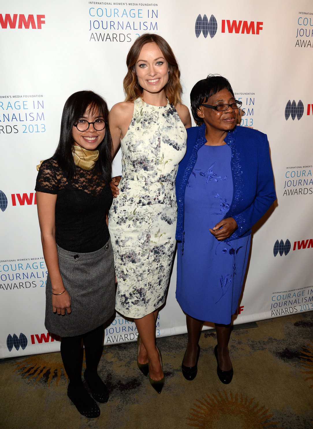 Olivia Wilde debuts her small baby bump while attending the 2013 International Women’s Media Foundation’s Courage in Journalism Awards at the Beverly Hills Hotel on Tuesday (October 29, 2013) in Beverly Hills, Calif.