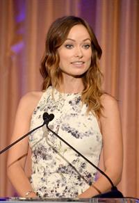 Olivia Wilde debuts her small baby bump while attending the 2013 International Women’s Media Foundation’s Courage in Journalism Awards at the Beverly Hills Hotel on Tuesday (October 29, 2013) in Beverly Hills, Calif.