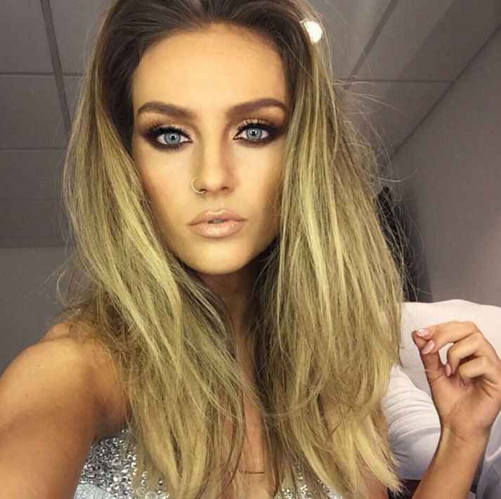 Perrie Edwards taking a selfie