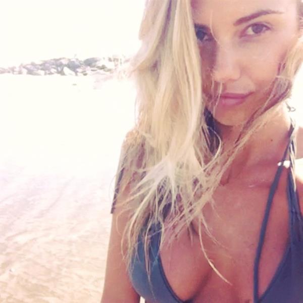 Sahara Ray in a bikini taking a selfie