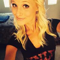 Tomi Lahren taking a selfie