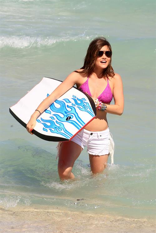 Lucy Hale and Ashley Benson photoshoot at the Bondo Bikini Shack on Miami Beach on March 24, 2012