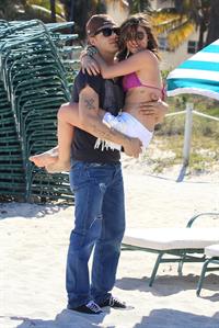 Lucy Hale and Ashley Benson photoshoot at the Bondo Bikini Shack on Miami Beach on March 24, 2012