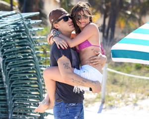 Lucy Hale and Ashley Benson photoshoot at the Bondo Bikini Shack on Miami Beach on March 24, 2012