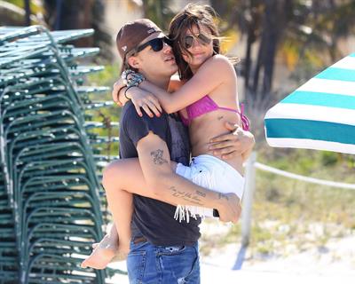 Lucy Hale and Ashley Benson photoshoot at the Bondo Bikini Shack on Miami Beach on March 24, 2012