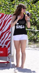 Lucy Hale and Ashley Benson photoshoot at the Bondo Bikini Shack on Miami Beach on March 24, 2012