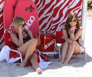 Lucy Hale and Ashley Benson photoshoot at the Bondo Bikini Shack on Miami Beach on March 24, 2012