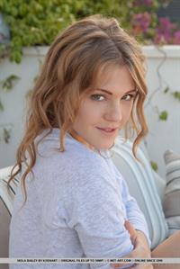 Viola Bailey gets naked on a patio