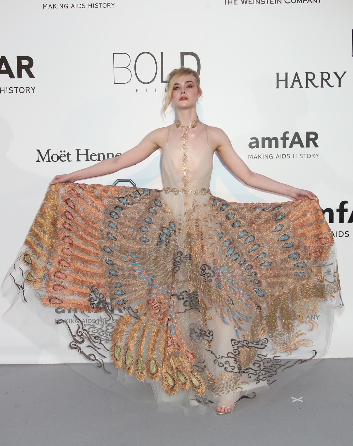 Elle Fanning showing off pasties at amfAR’s 23rd Cinema Against AIDS Gala