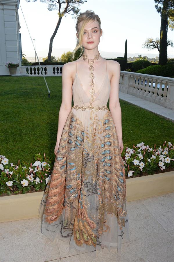 Elle Fanning showing off pasties at amfAR’s 23rd Cinema Against AIDS Gala