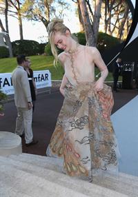 Elle Fanning showing off pasties at amfAR’s 23rd Cinema Against AIDS Gala