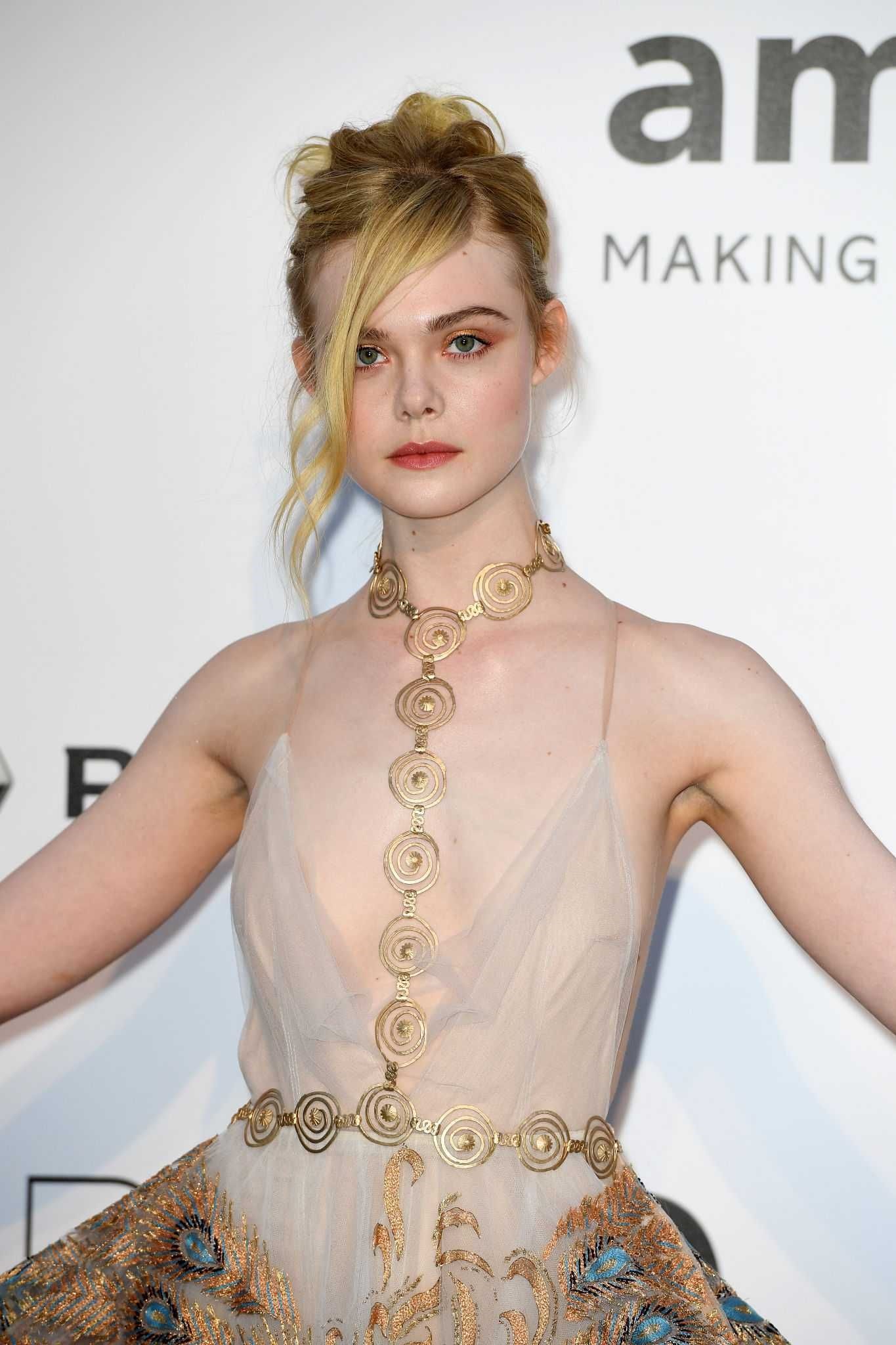 Elle Fanning showing off pasties at amfAR’s 23rd Cinema Against AIDS Gala