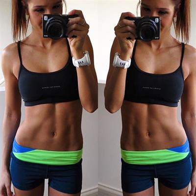 Kayla Itsines taking a selfie