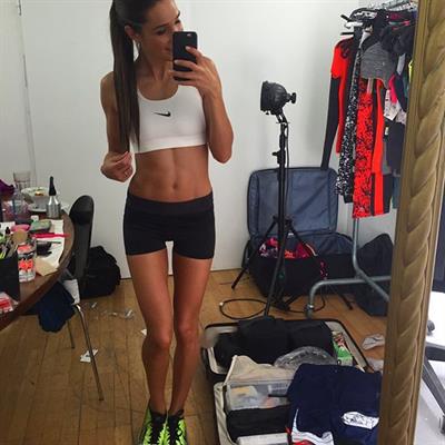 Kayla Itsines taking a selfie