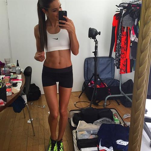 Kayla Itsines taking a selfie