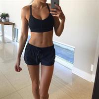 Kayla Itsines taking a selfie