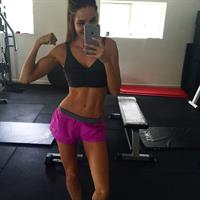 Kayla Itsines taking a selfie