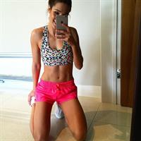 Kayla Itsines taking a selfie