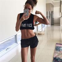 Kayla Itsines taking a selfie