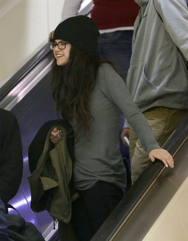 Selena Gomez arrives on a flight at Los Angeles Airport December 21, 2012 