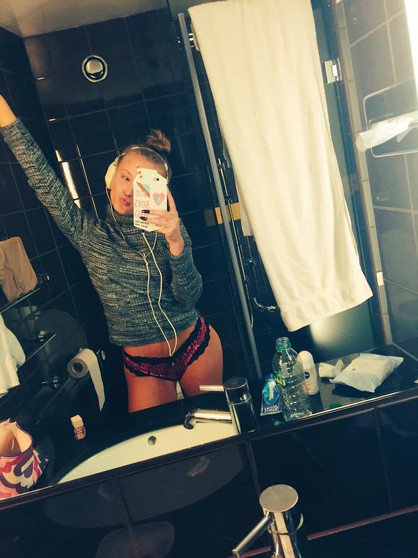 Zara Larsson in lingerie taking a selfie