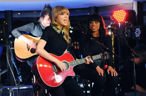 Taylor Swift performs at a private concert for NRJ on a barge on The Seine January 28, 2013 