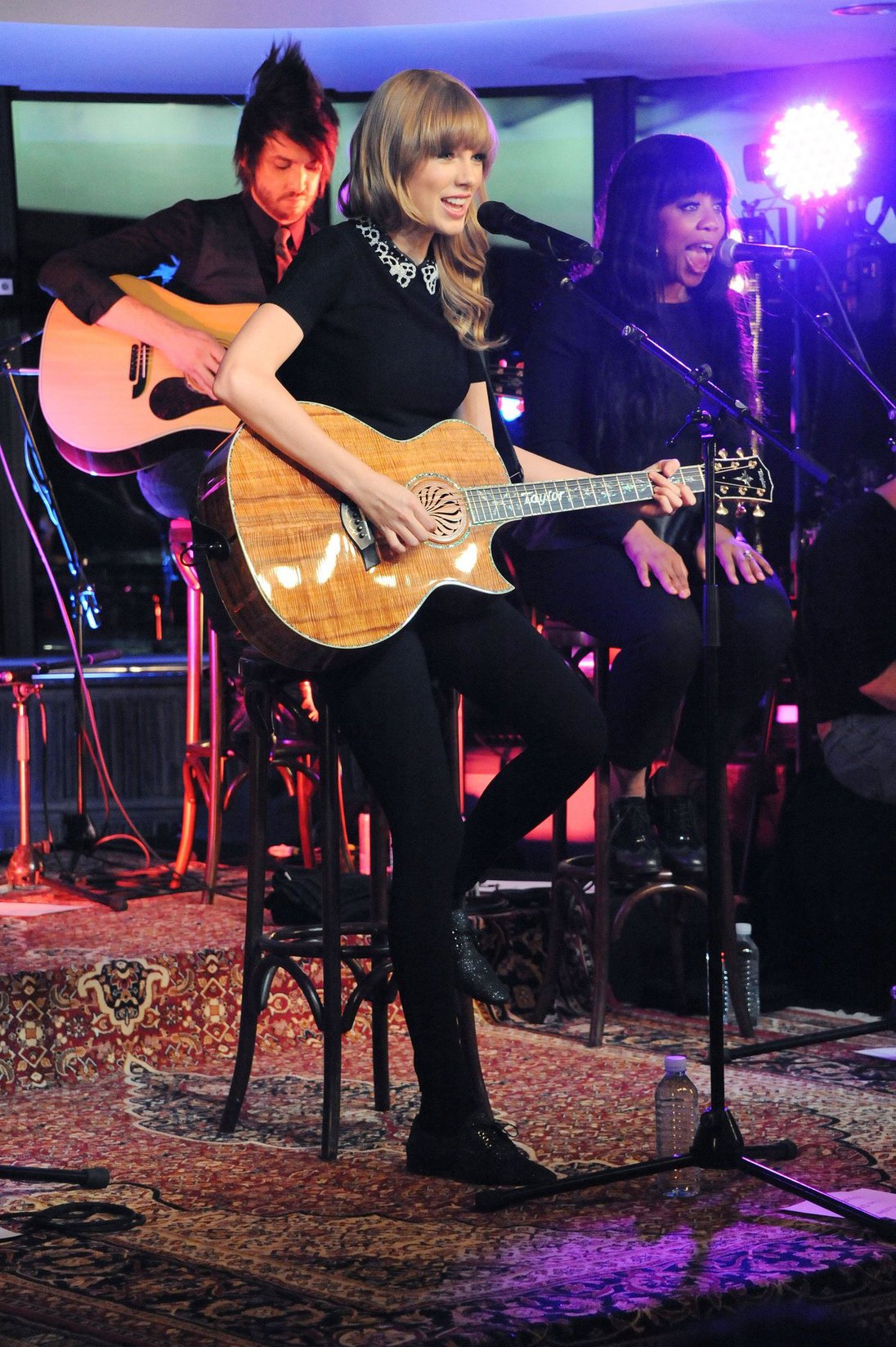 Taylor Swift performs at a private concert for NRJ on a barge on The Seine January 28, 2013 