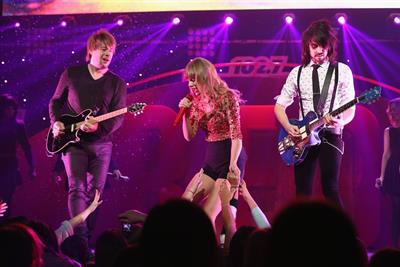 Taylor Swift on stage at the KIIS FM 2012 Jingle Ball concert at Nokia Theatre in Los Angeles - December 1, 2012 