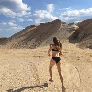 Kristine Froseth in a bikini - ass