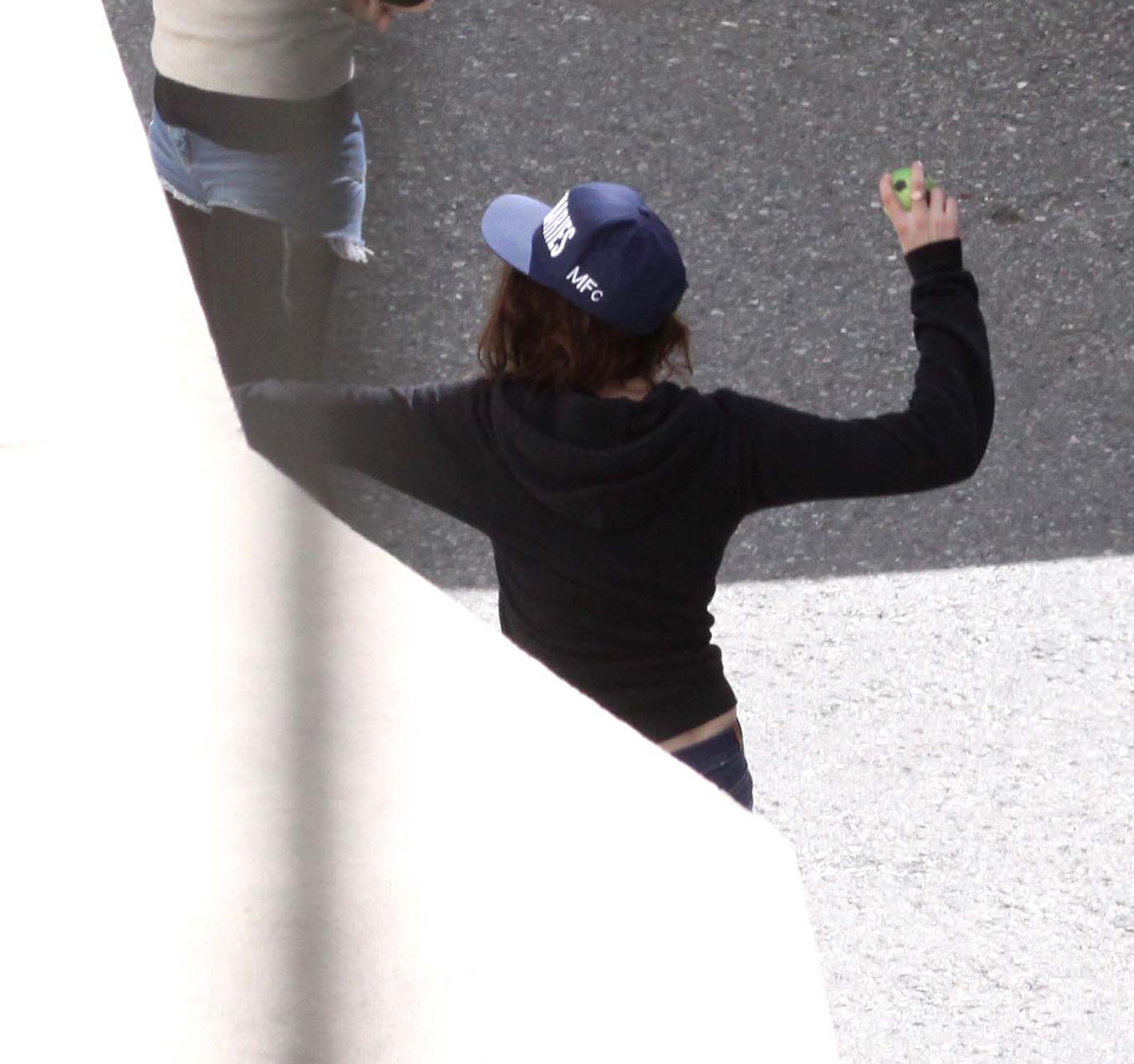 Kristen Stewart playing with a ball on the set of  Sils Maria  in Switzerland September 20, 2013  