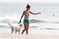 Olivia Wilde - on the beach in Wilmington,North Carolina - August 18 2012
