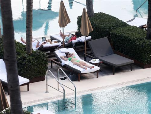 Kelly Brook bikini candids by the pool in Miami 2/1/13 