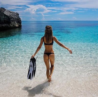 Alexis Ren in a bikini - ass