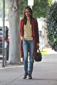 Zoe Saldana out and about in West Hollywood wearing a long red sweater coat January 19-2012 