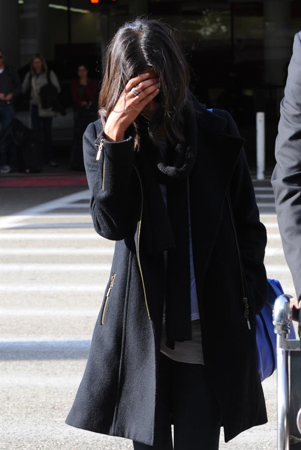 Zoe Saldana arriving into LA Airport - April 4, 2010  