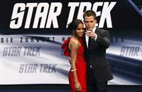 Zoe Saldana poses on the red carpet during the German premiere of the movie Star Trek April 16   