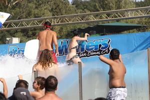 Katy Perry talks with a group of her friends after spending the afternoon at Raging Waters in San Dimas, California on August 12, 2012