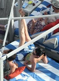 Katy Perry - In a bikini at a hotel pool in Miami July 27, 2012