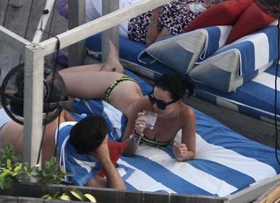 Katy Perry - In a bikini at a hotel pool in Miami July 27, 2012