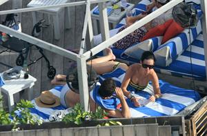 Katy Perry - In a bikini at a hotel pool in Miami July 27, 2012