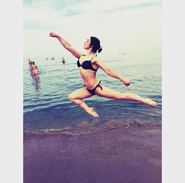 Aliya Mustafina in a bikini