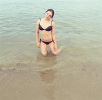 Aliya Mustafina in a bikini