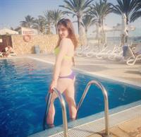Aliya Mustafina in a bikini - ass